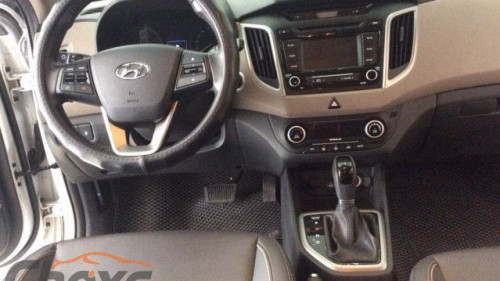 Hyundai Tucson  1.6 AT  2016 - Bán xe Hyundai Tucson 1.6 AT sản xuất 2016, màu trắng số tự động