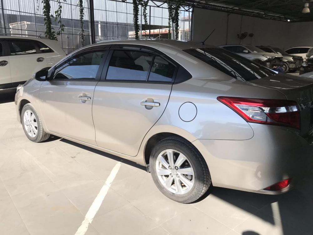 Toyota Vios 1.5G (CVT) 2017 - Bán Toyota Vios G 1.5AT màu vàng cát, số tự động, sản xuất 2017, biển Sài Gòn mới 99%