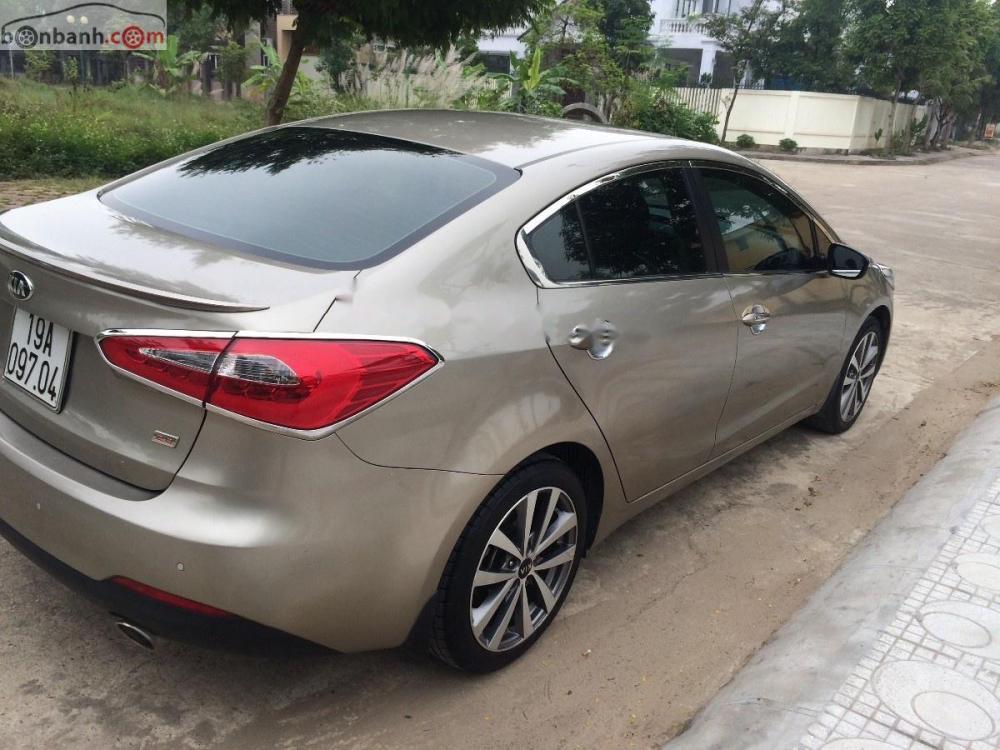 Kia K3 2015 - Chính chủ bán xe Kia K3 đời 2015, màu vàng cát