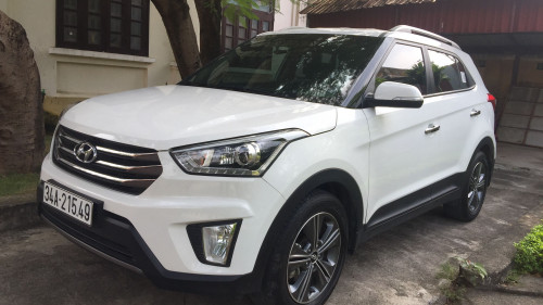 Hyundai Tucson  1.6 AT  2016 - Bán xe Hyundai Tucson 1.6 AT sản xuất 2016, màu trắng số tự động