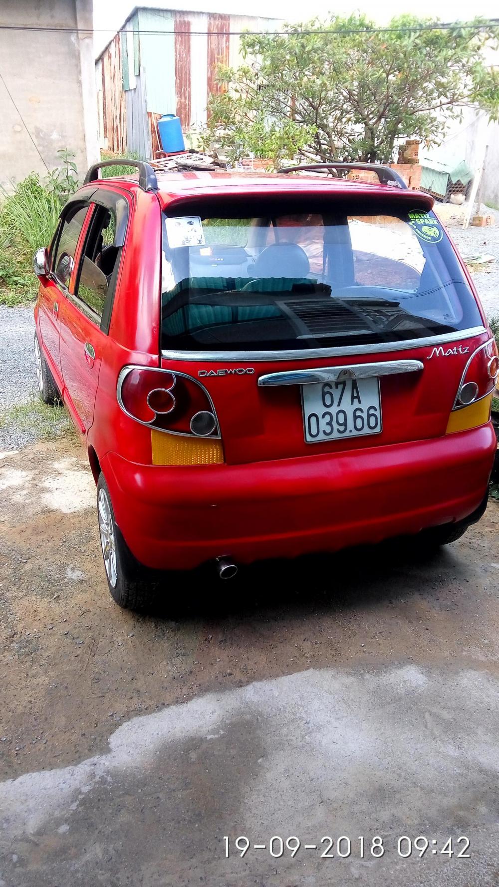 Daewoo Matiz 2007 - Bán xe Daewoo Matiz đăng ký lần đầu 2007, màu đỏ còn mới, giá 115 triệu