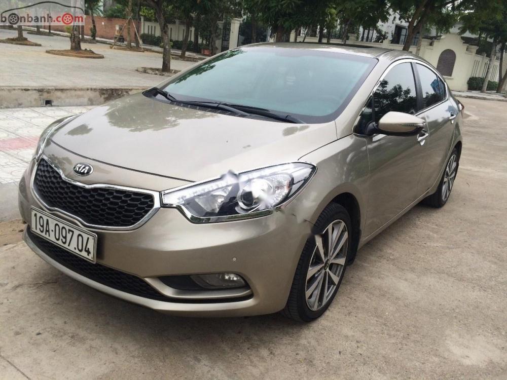 Kia K3 2015 - Chính chủ bán xe Kia K3 đời 2015, màu vàng cát