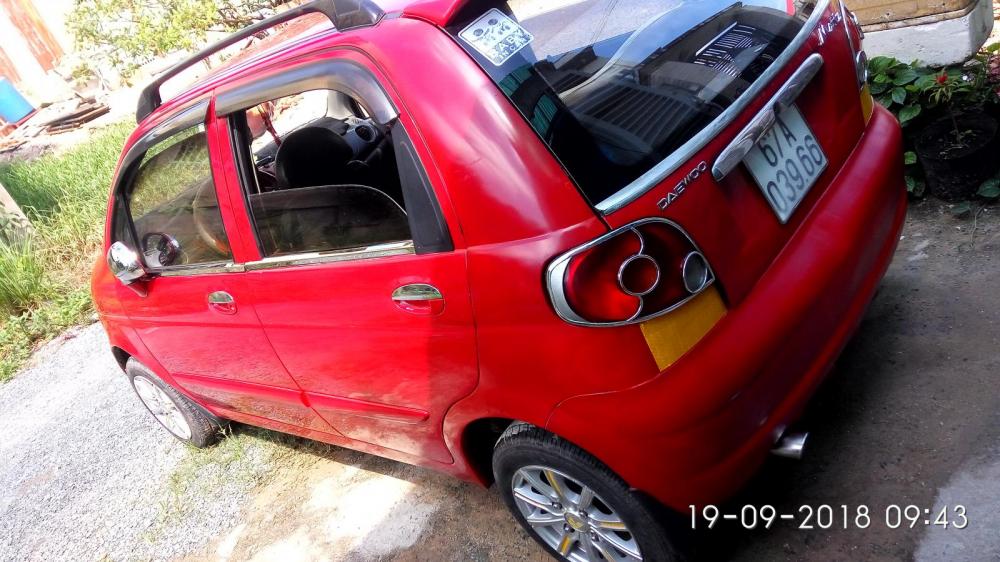 Daewoo Matiz 2007 - Bán xe Daewoo Matiz đăng ký lần đầu 2007, màu đỏ còn mới, giá 115 triệu