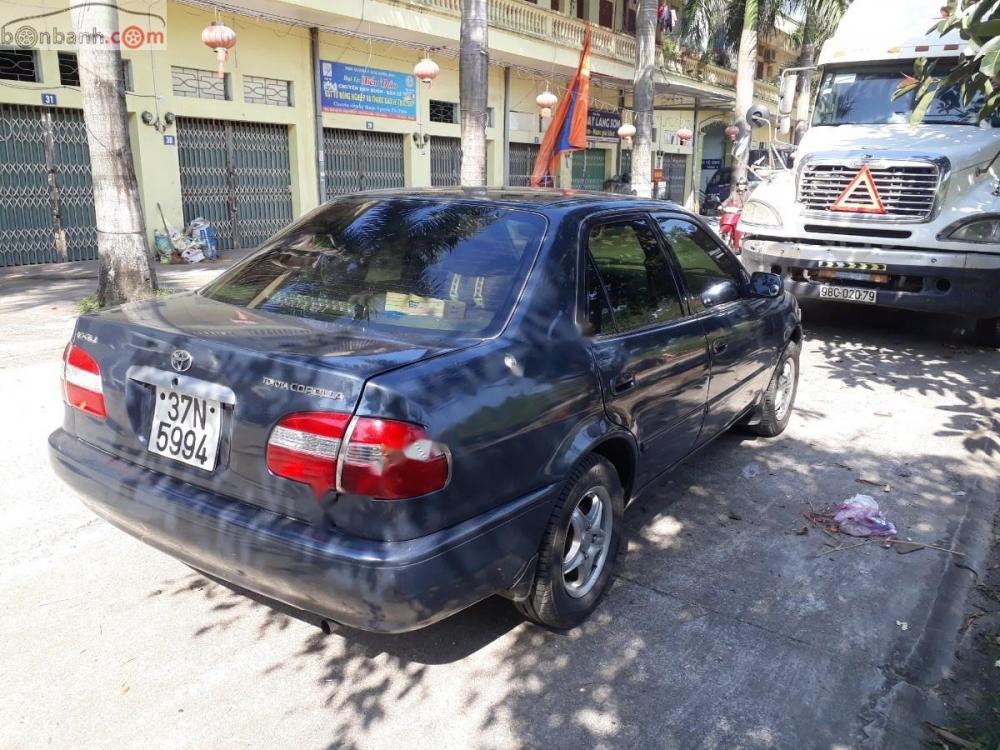 Toyota Corolla 1.6 MT 1997 - Bán xe Toyota Corolla 1.6 MT 1997, màu xanh, nhập khẩu