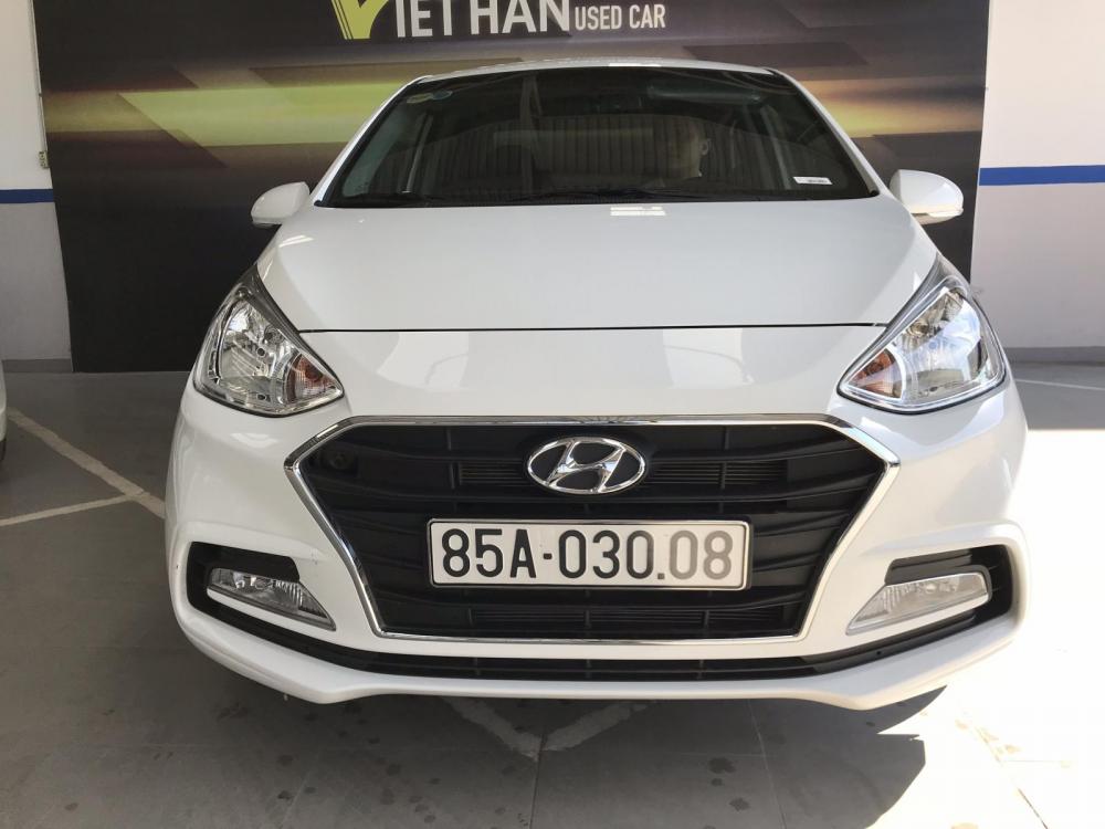 Hyundai Grand i10 1.2AT   2018 - Bán Hyundai Grand i10 sedan 1.2AT màu trắng, số tự động, sản xuất 2018, bản gia đình lăn bánh 11000km