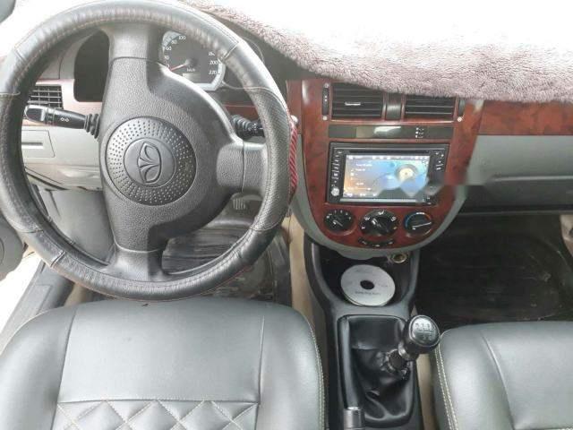 Daewoo Lacetti   2012 - Bán ô tô Daewoo Lacetti năm 2012, màu bạc, xe nhập, số sàn