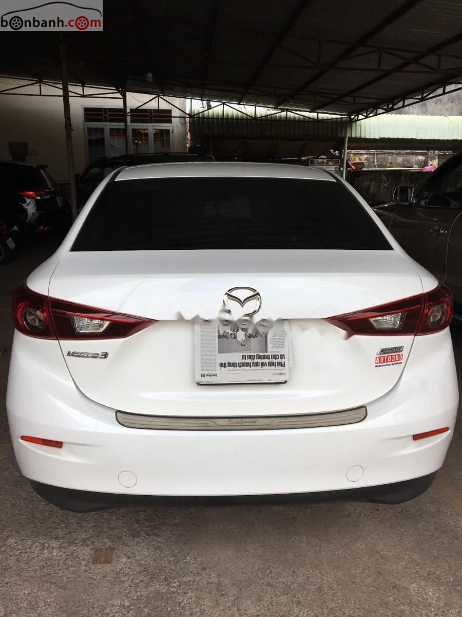 Mazda 3 1.5 AT 2016 - Bán Mazda 3 1.5 AT đời 2016, màu trắng còn mới