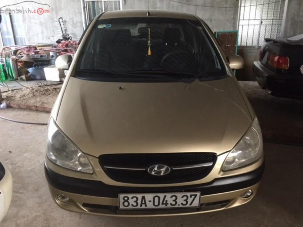 Hyundai Getz 1.1 MT 2009 - Cần bán Hyundai Getz 1.1 MT sản xuất 2009, màu vàng, nhập khẩu 