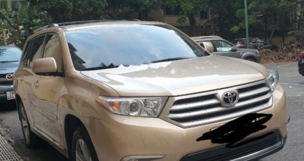 Toyota Highlander SE 2.7 2010 - Bán Toyota Highlander SE 2.7 năm sản xuất 2010, màu vàng cát, xe nhập