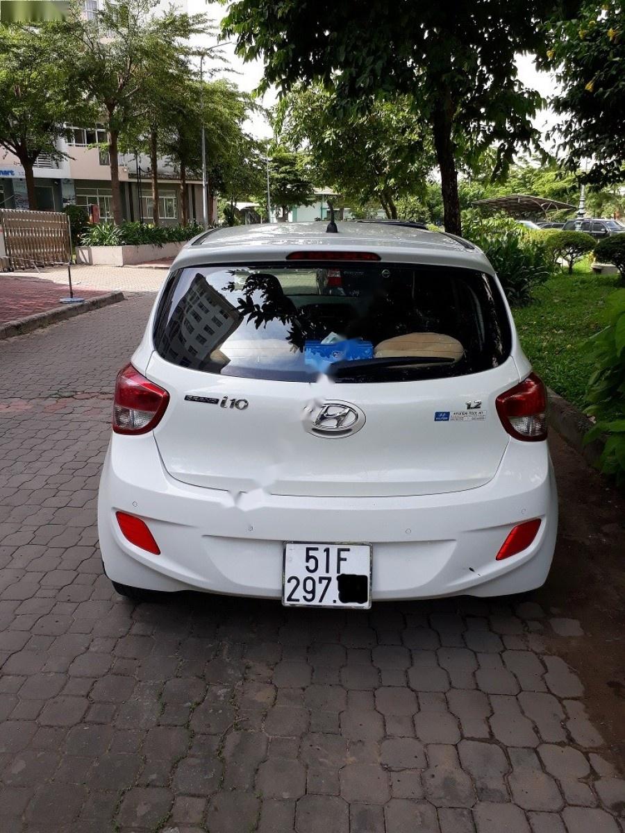 Hyundai Grand i10 1.2 AT 2014 - Bán Hyundai Grand i10 1.2 AT đời 2014, màu trắng, xe nhập số tự động, giá 350tr