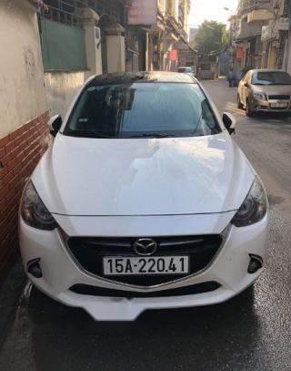 Mazda 2 2015 - Cần bán xe Mazda 2 sản xuất năm 2015, màu trắng giá cạnh tranh