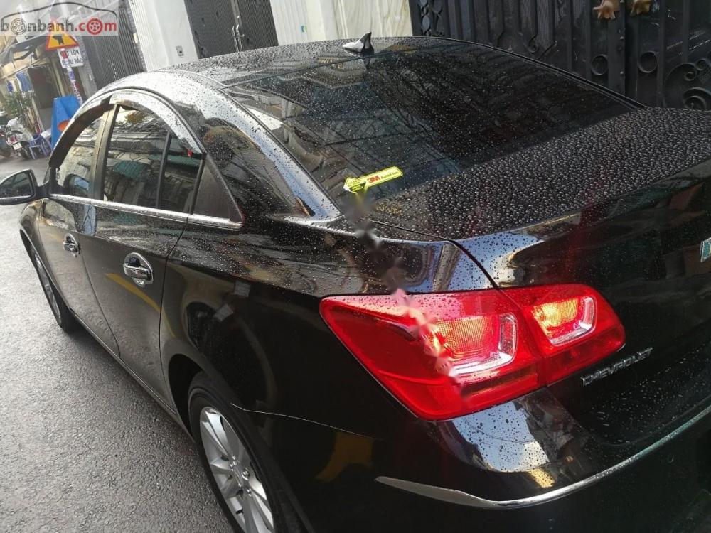 Chevrolet Cruze LT 2016 - Bán xe Chevrolet Cruze LT sản xuất 2016, màu đen chính chủ