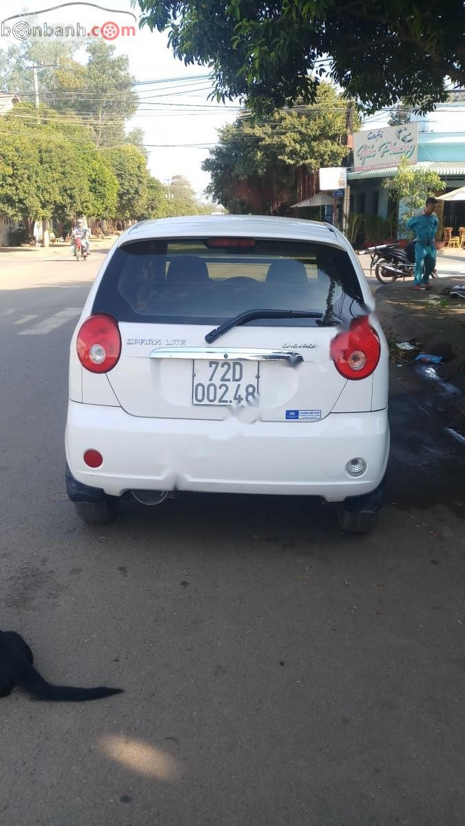 Chevrolet Spark Lite Van 0.8 MT 2014 - Cần bán Chevrolet Spark Lite Van 0.8 MT đời 2014, màu trắng chính chủ