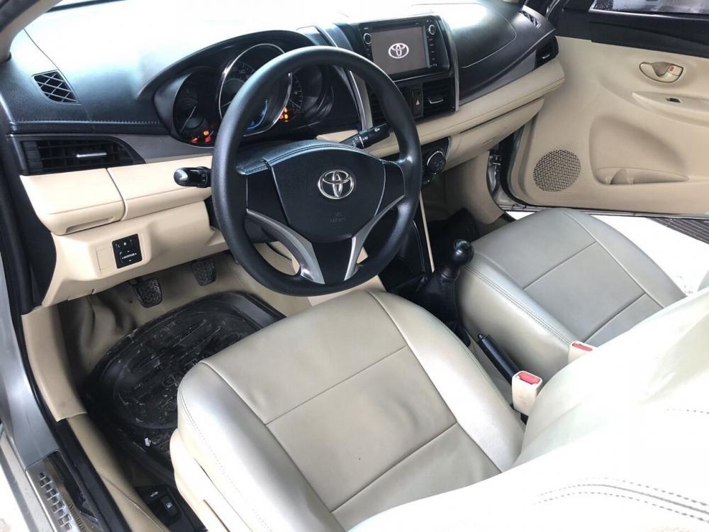 Toyota Vios E 1.5MT 2015 - Bán Toyota Vios E 1.5MT màu bạc, sản xuất 2015 biển Sài Gòn đi 58000km