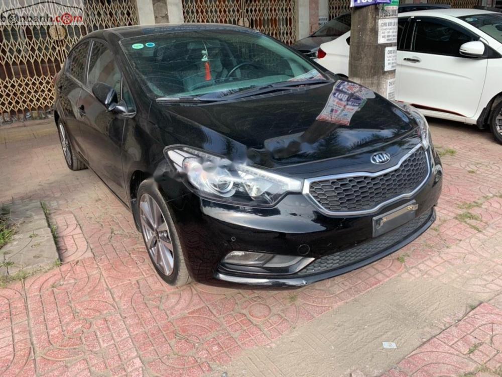 Kia K3 1.6 2015 - Bán Kia K3 1.6 sản xuất năm 2015, màu đen số tự động, giá chỉ 518 triệu