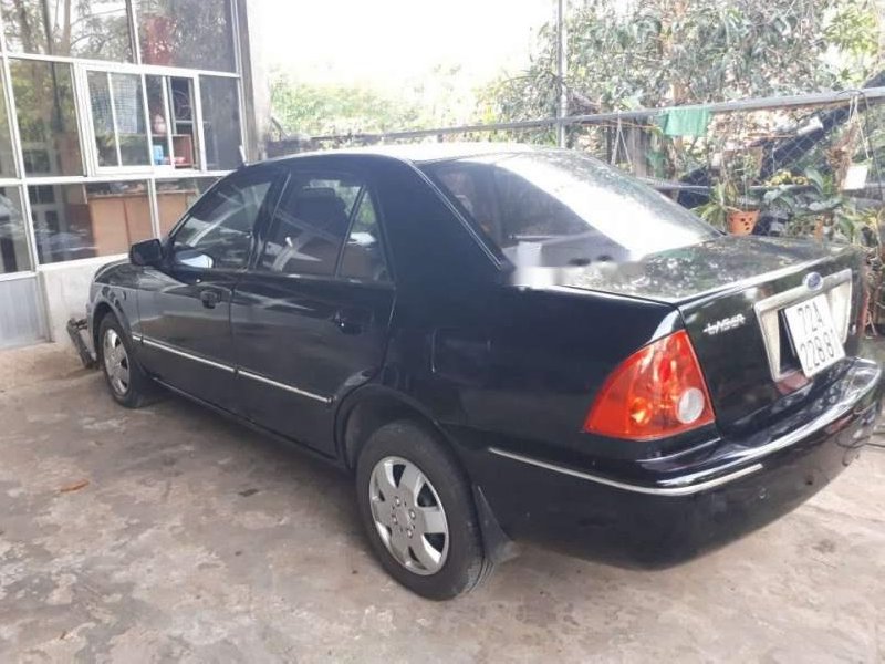 Ford Laser 1.6 2002 - Bán xe Ford Laser 1.6 sản xuất 2002, màu đen, giá chỉ 180 triệu