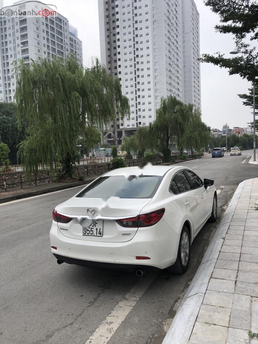 Mazda 6 2.0 AT 2014 - Cần bán lại xe Mazda 6 2.0 AT năm sản xuất 2014, màu trắng, nhập khẩu