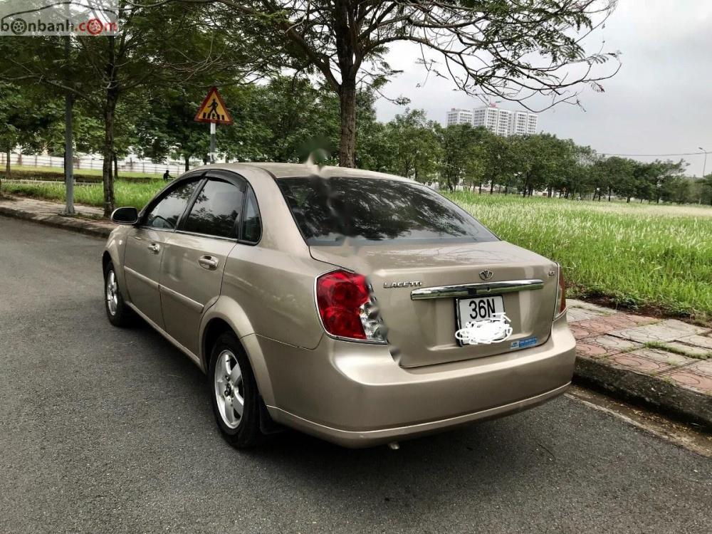 Daewoo Lacetti EX 2009 - Bán xe Daewoo Lacetti EX năm 2009, màu vàng chính chủ