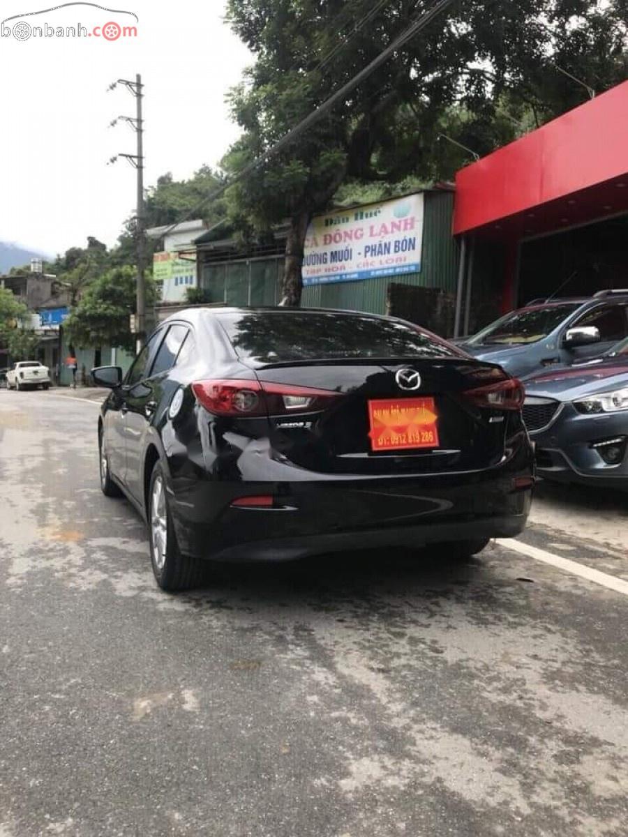 Mazda 3 1.5 AT 2015 - Cần bán Mazda 3 1.5 AT năm 2015, màu đen số tự động