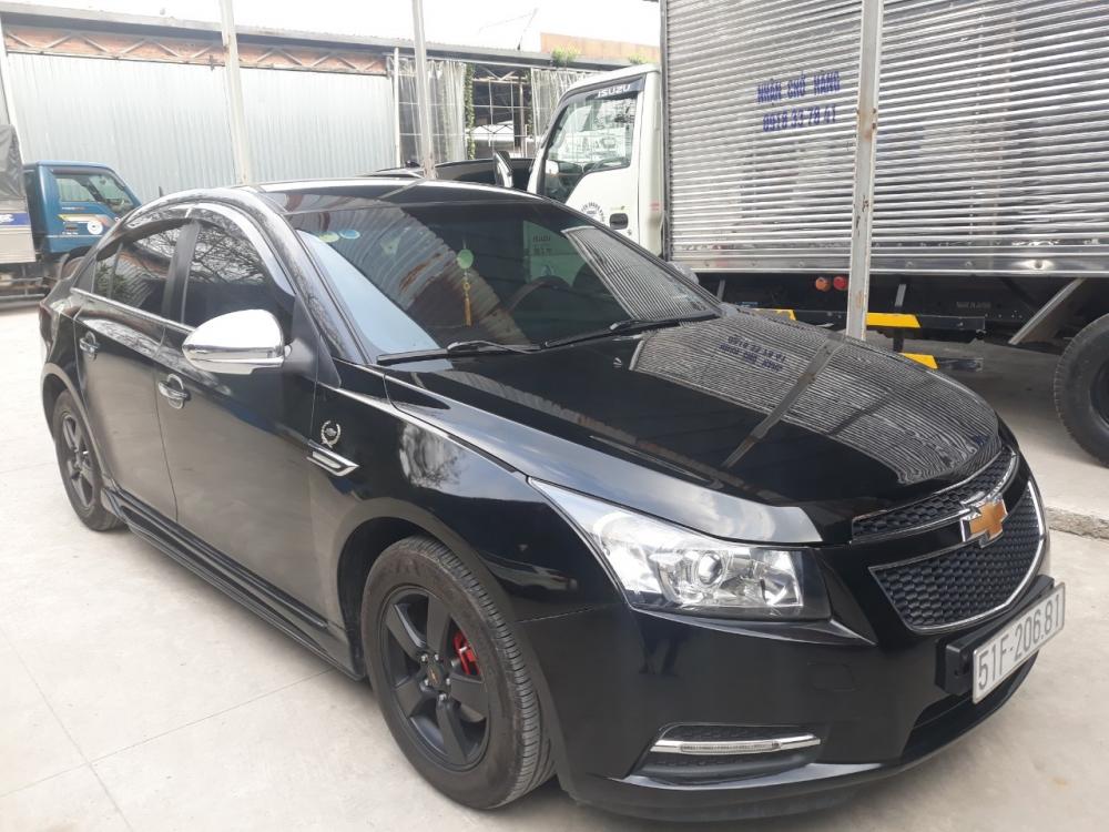 Chevrolet Cruze LS   2012 - Bán Chevrolet Cruze LS màu đen, số sàn, sản xuất 2012 biển Sài Gòn, đi đúng 80.000km, xe rất đẹp