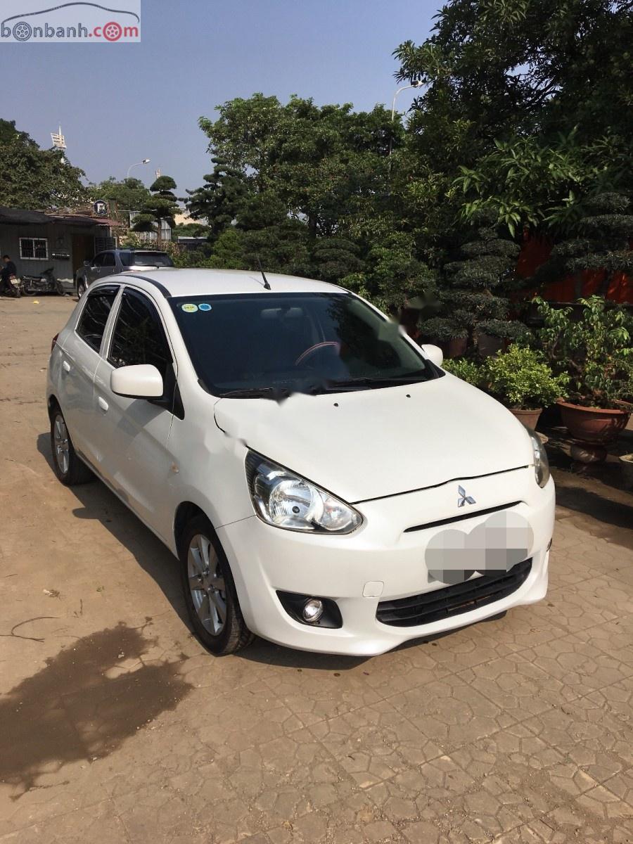 Mitsubishi Mirage MT 2014 - Cần bán gấp Mitsubishi Mirage MT năm 2014, màu trắng, nhập khẩu  