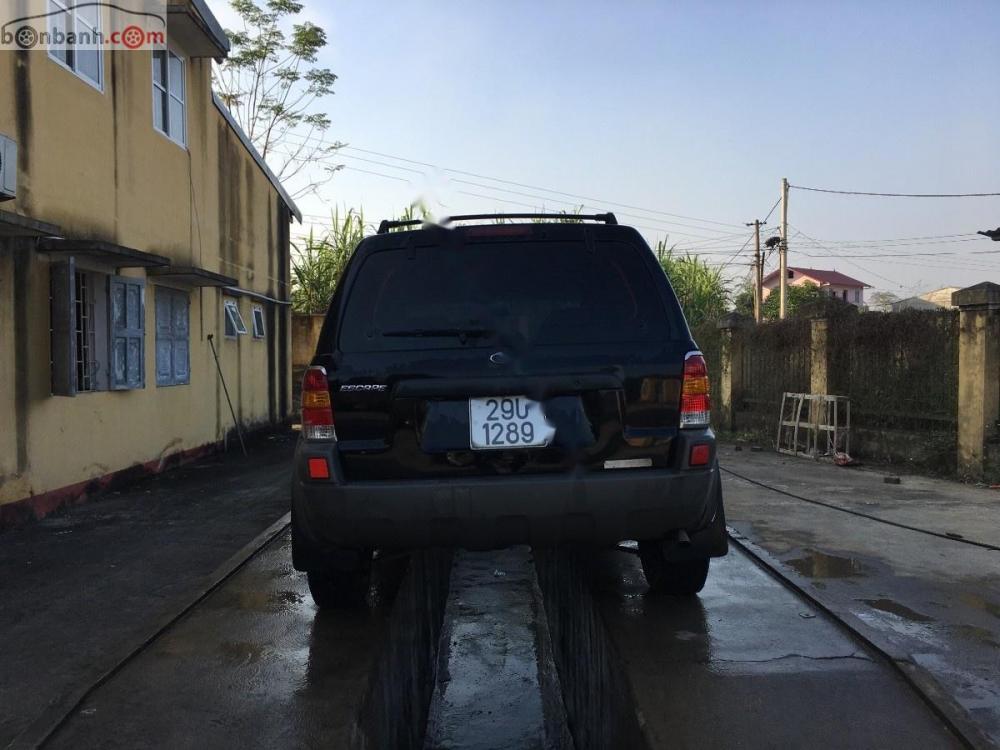 Ford Escape 2.0 4x4 Auto MT  2003 - Cần bán lại xe Ford Escape 2.0 4x4 Auto MT sản xuất 2003, màu đen