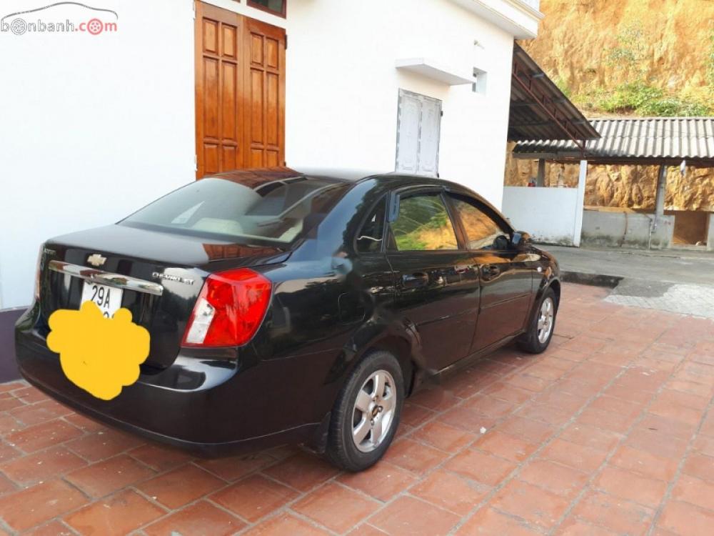 Chevrolet Lacetti 2011 - Cần bán lại xe Chevrolet Lacetti đời 2011, màu đen số sàn, giá tốt