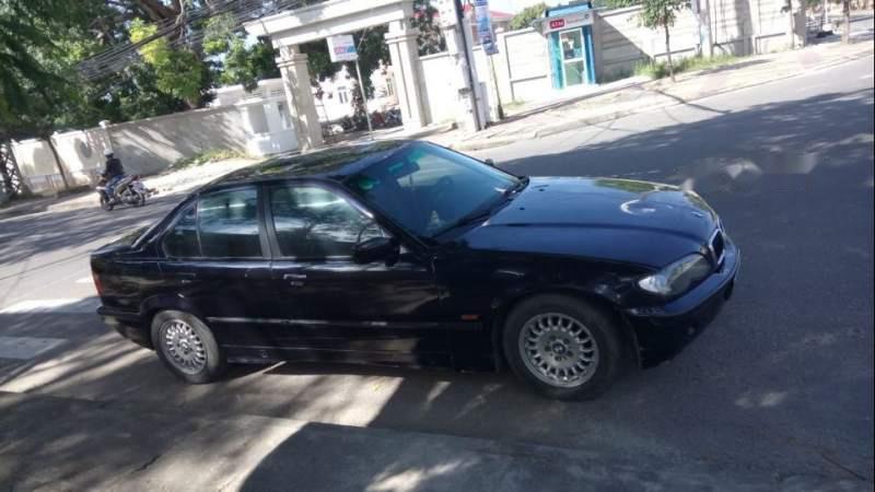 BMW 3 Series 320i 1997 - Cần bán BMW 320i 1997, màu đen, xe nhập