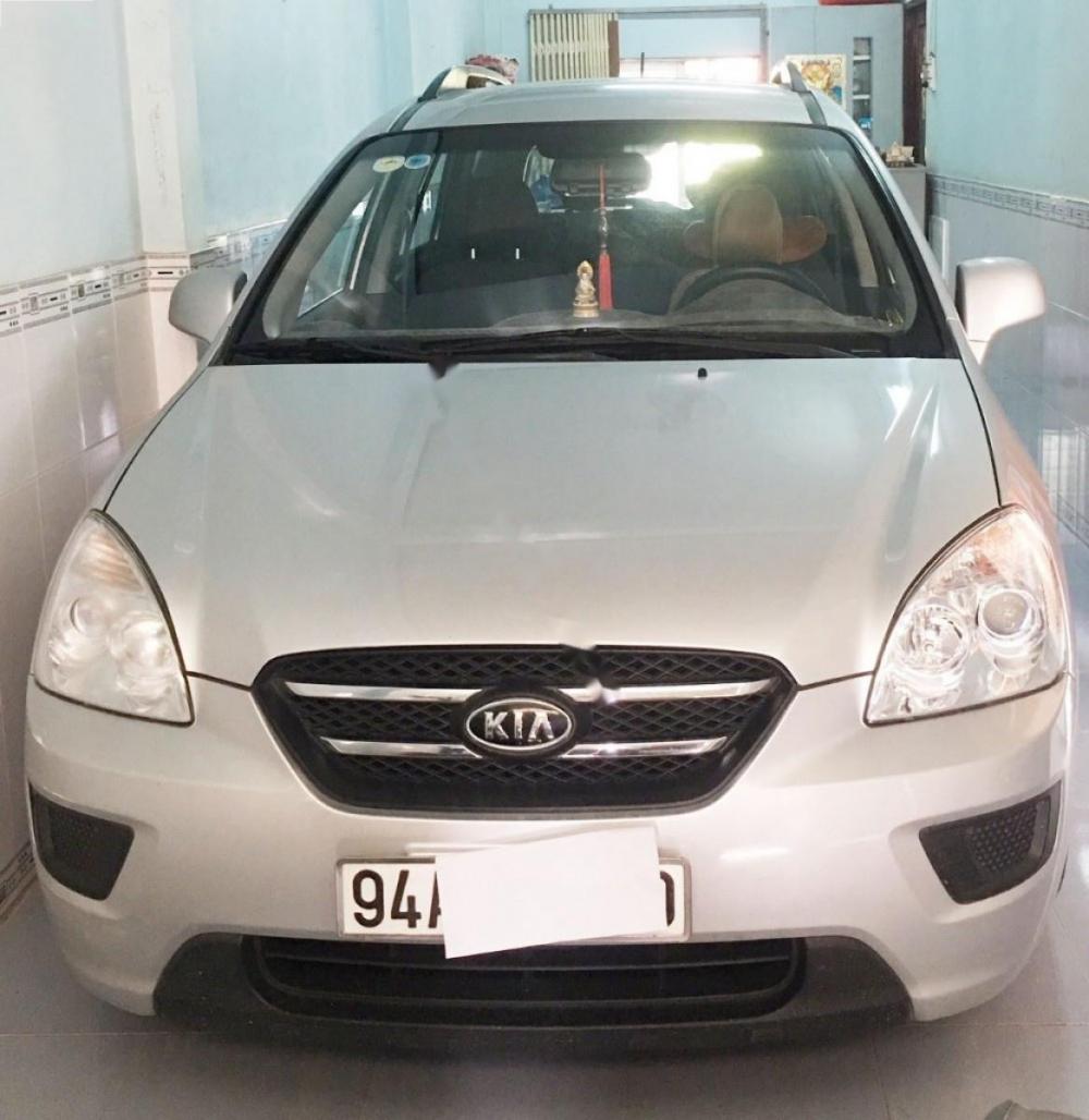 Kia Carens LX 1.6 MT 2010 - Bán ô tô Kia Carens LX 1.6 MT đời 2010, màu bạc xe gia đình 