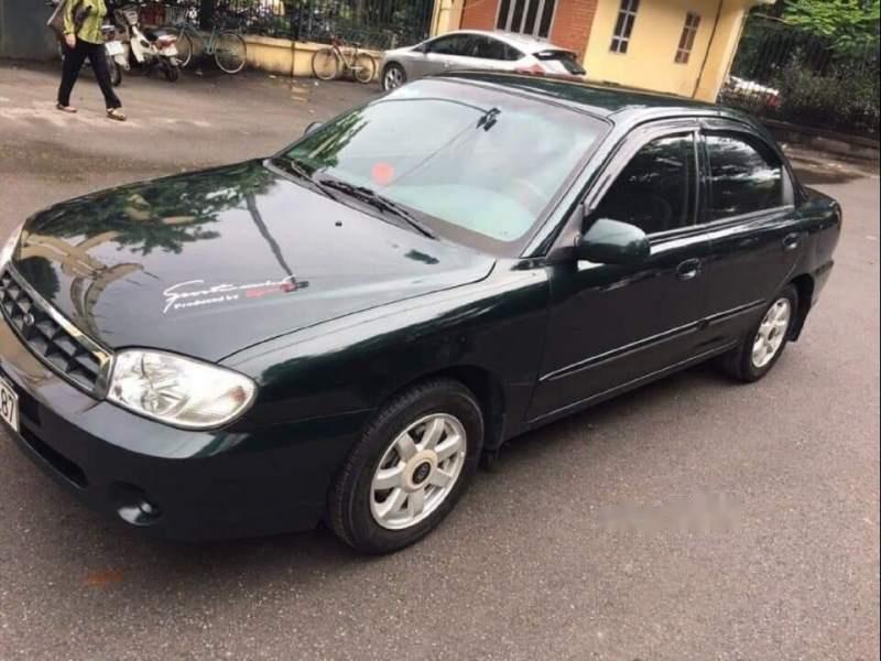 Kia Spectra LS 2004 - Cần bán gấp Kia Spectra LS 2004, màu đen, xe nhập, số sàn