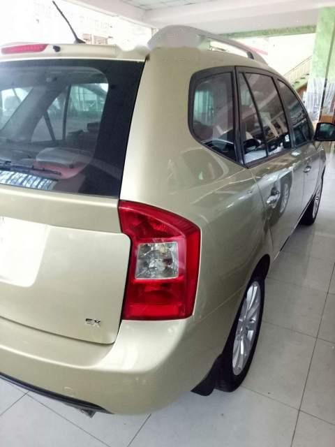 Kia Carens 2014 - Cần bán xe Kia Carens đời 2014, màu vàng số sàn