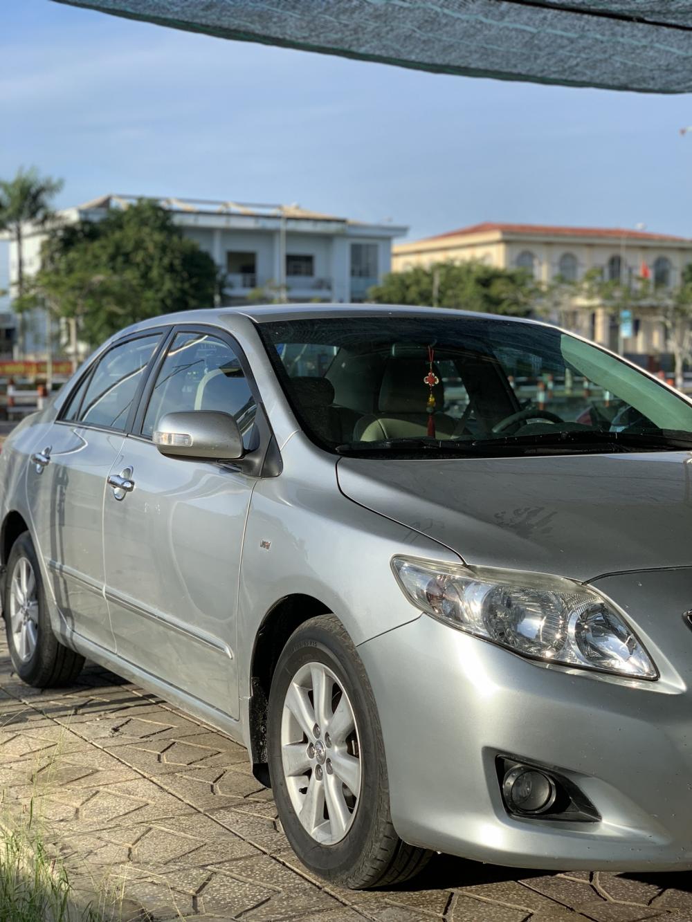 Toyota Corolla altis G 2010 - Cần bán Toyota Corolla altis G đời 2010, màu bạc