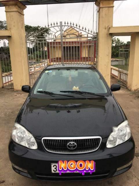 Toyota Corolla altis 1.8G MT 2003 - Bán Toyota Corolla altis 1.8G MT đời 2003, màu đen số sàn, giá chỉ 243 triệu