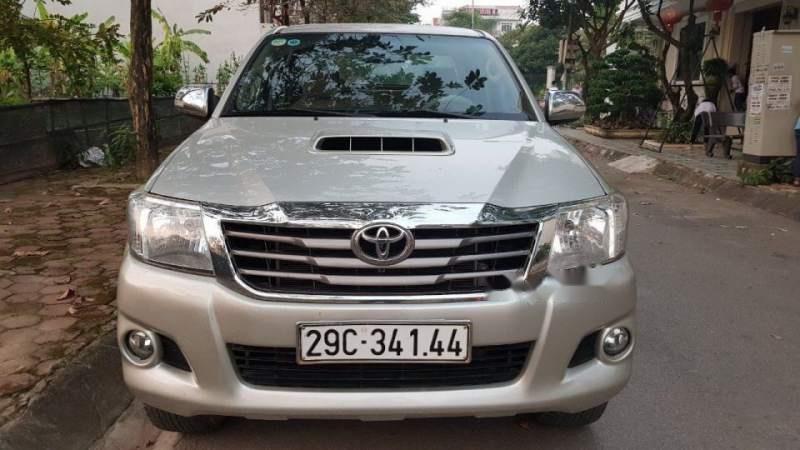 Toyota Hilux E 2014 - Chợ ô tô Giải phóng bán xe Toyota Hilux E 2014, màu bạc, nhập khẩu