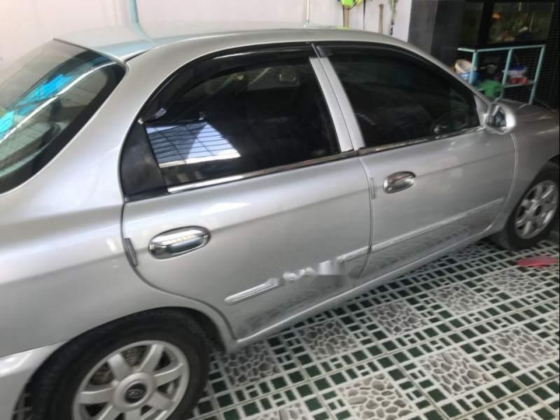 Kia Spectra 2004 - Bán Kia Spectra năm sản xuất 2004, màu bạc 