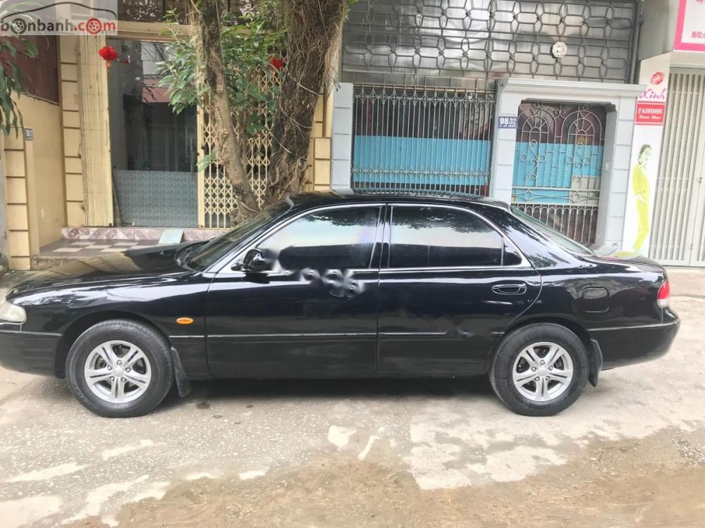 Mazda 626 1997 - Cần bán xe Mazda 626 1997, màu đen, nhập khẩu nguyên chiếc 