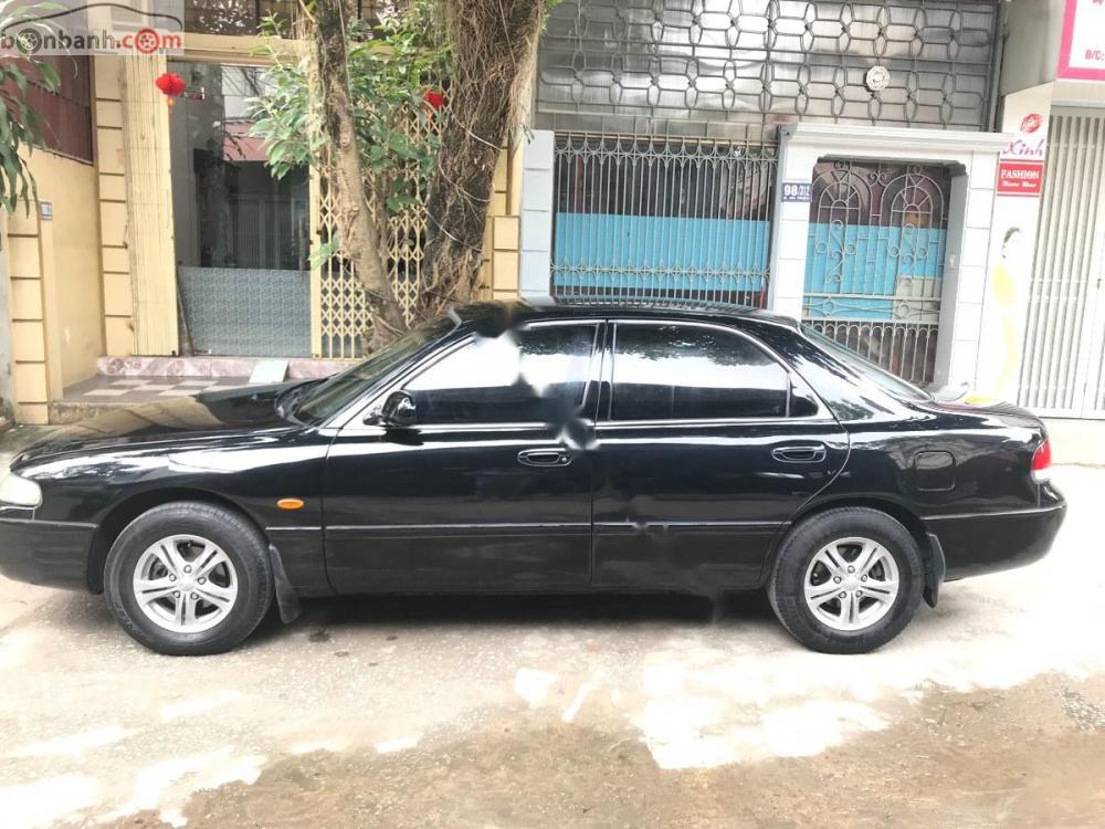 Mazda 626 1997 - Cần bán xe Mazda 626 1997, màu đen, nhập khẩu nguyên chiếc 