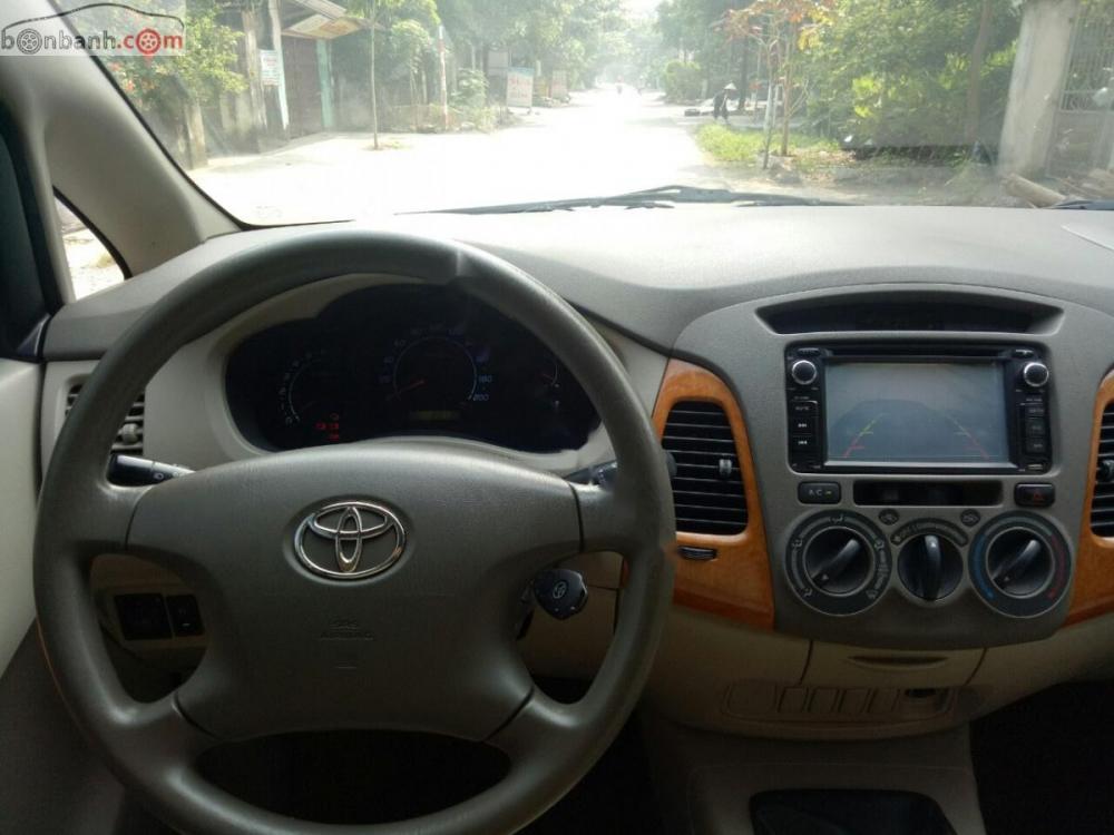 Toyota Innova G 2010 - Tôi bán xe Innova G 2.0 màu bạc, số tay s, ản xuất năm 2010, đã đi 8,5 vạn