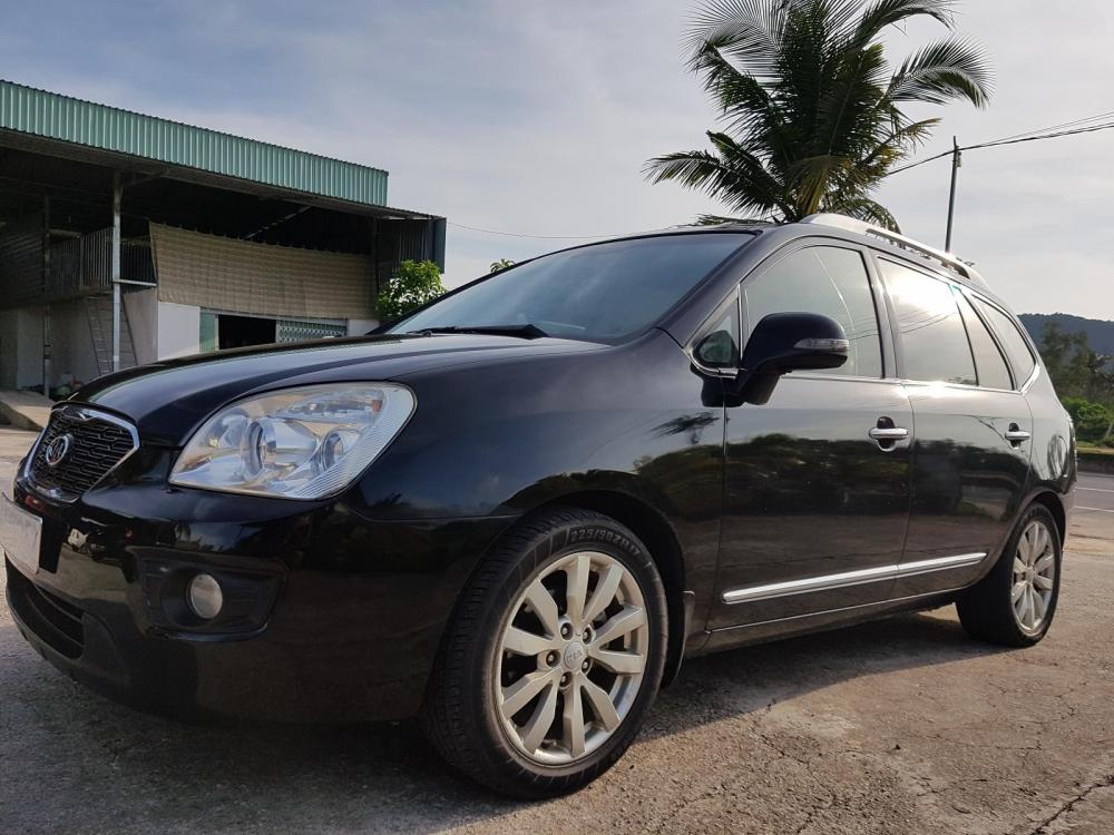 Kia Carens EX 2011 - Bán Kia Carens sản xuất 2011 màu đen giá 335 triệu đồng