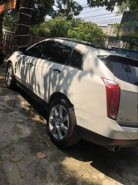 Cadillac SRX 2010 - Cần bán lại xe Cadillac SRX 2010, màu trắng