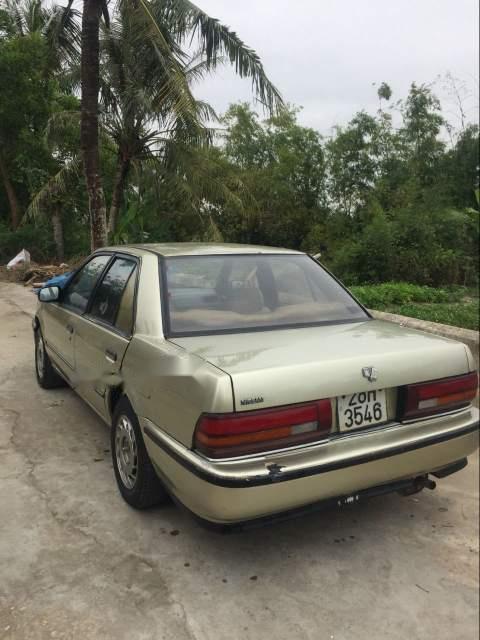 Nissan Bluebird   1989 - Cần bán gấp Nissan Bluebird sản xuất năm 1989, màu vàng