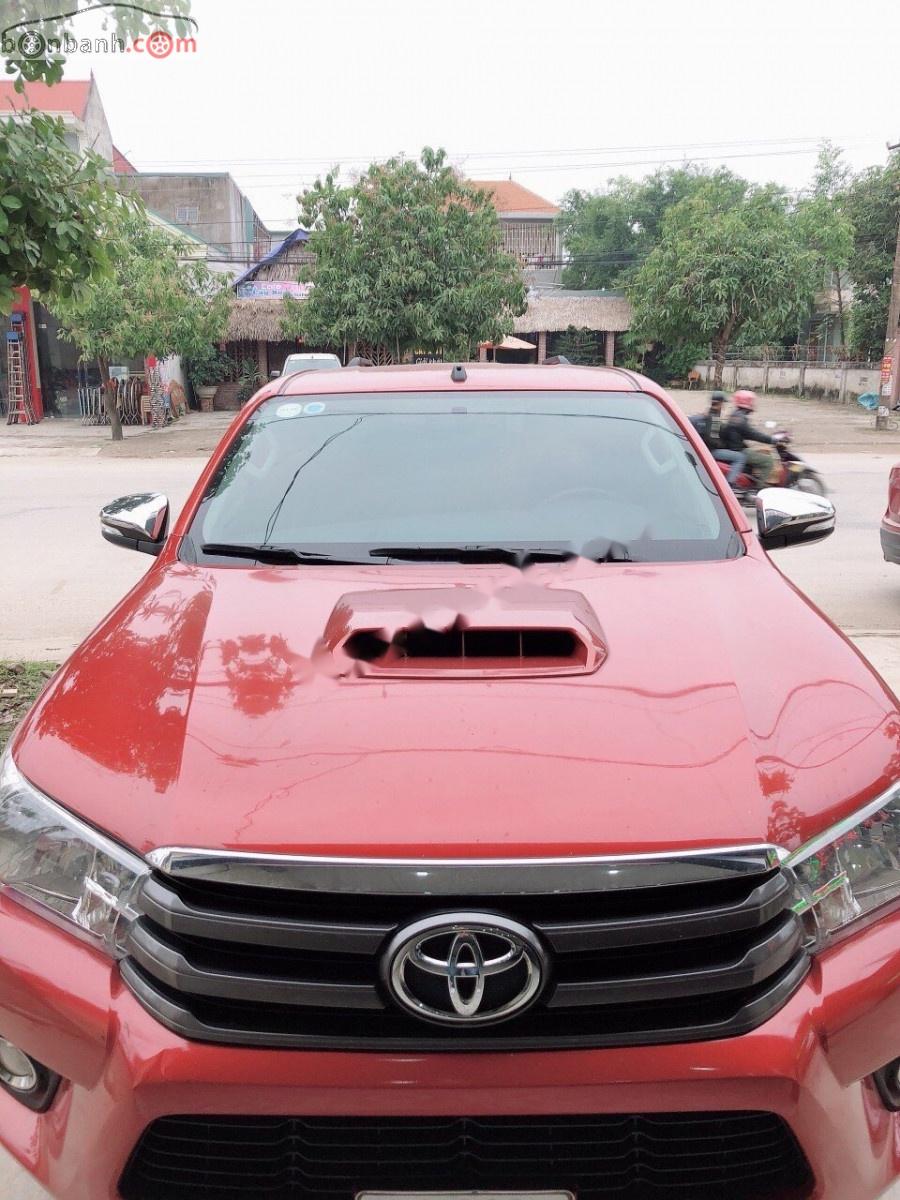 Toyota Hilux 2.5E 4x2 MT 2015 - Bán ô tô Toyota Hilux 2.5E 4x2 MT đời 2015, màu đỏ, nhập khẩu