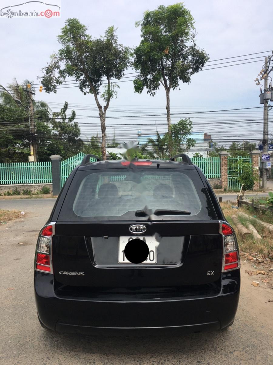 Kia Carens 2.0  2010 - Bán ô tô Kia Carens 2.0 đời 2010, màu đen xe gia đình