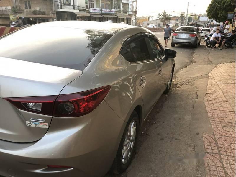 Mazda 626 2015 - Cần bán gấp Mazda 626 đời 2015, màu vàng còn mới, giá tốt