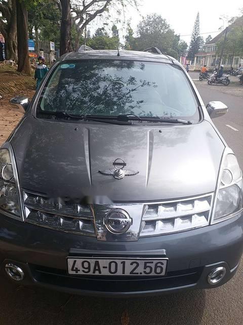 Nissan Grand livina   2010 - Cần bán Nissan Grand livina năm 2010, màu xám, xe gia đình 