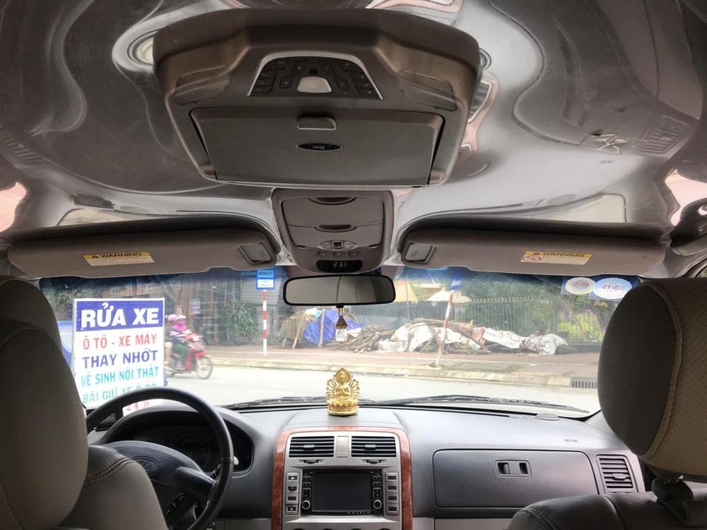 Kia Carnival GS 2006 - Cần bán xe Kia Carnival năm 2006 màu đen, giá chỉ 220 triệu, nhập khẩu