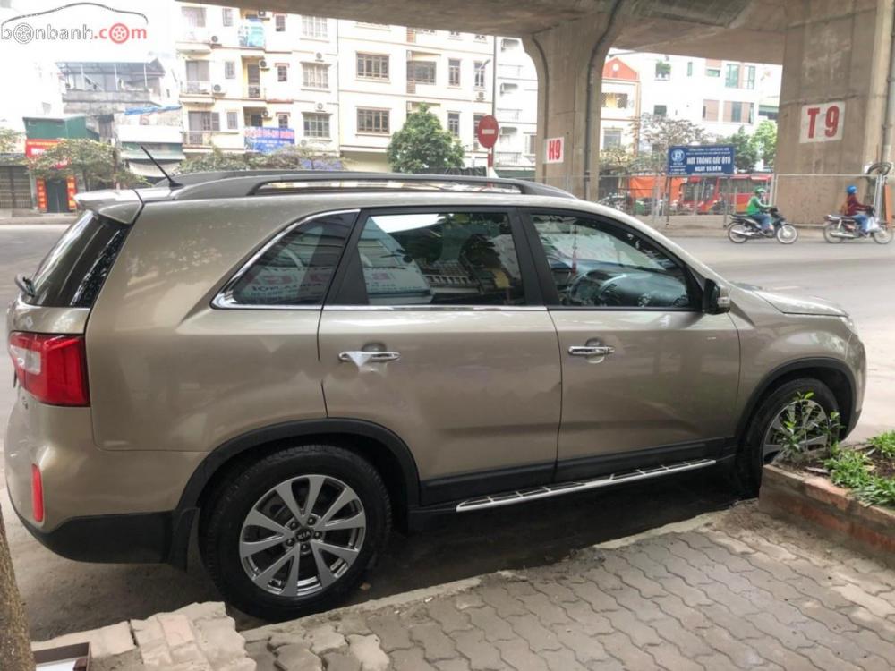 Kia Sorento AT 2014 - Bán Kia Sorento 2014 số AT dẫn động 2WD, chạy dầu 6.1lít/100km, màu nâu, nội thất đen