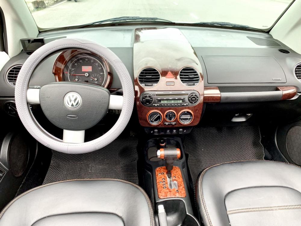 Volkswagen Beetle 2.5 2007 - Beetle 2.5 nhập 2007 mui trần, hàng full cao cấp, số tự động 6 cấp, xe còn rất mới