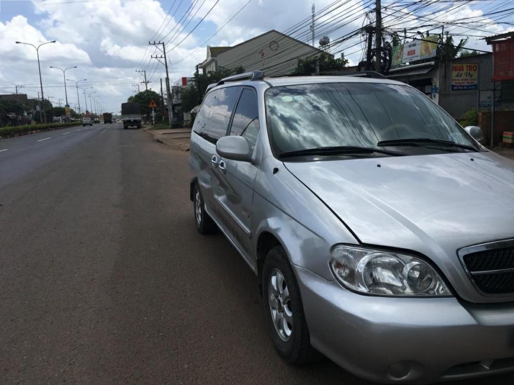 Kia Carnival GS 2.5 MT 2008 - Gia đình cần bán xe Kia Carnival 7 chỗ, màu bạc, số sàn, sx năm 2008