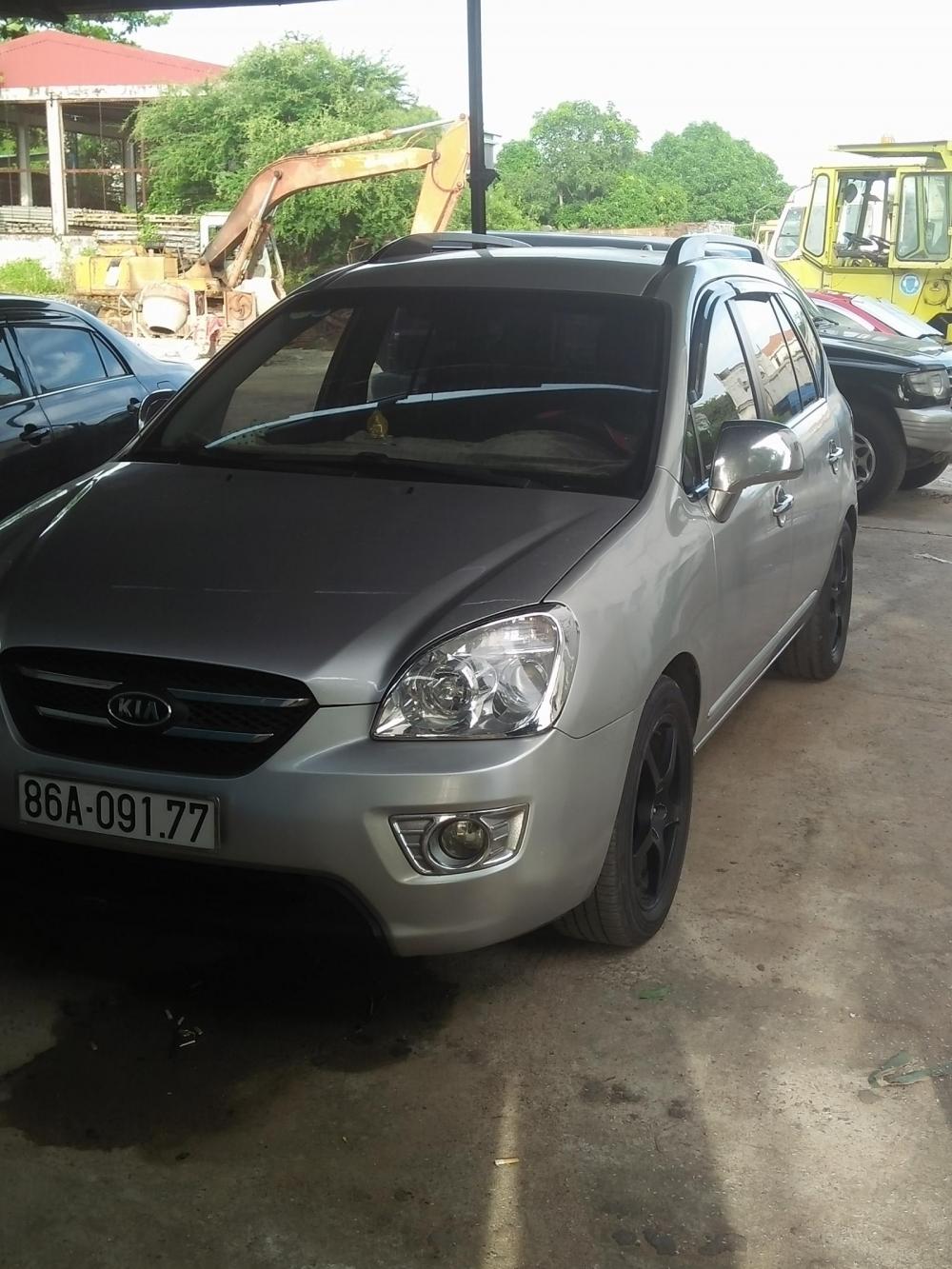 Kia Carens Lx 2010 - Bán xe Kia Carens LX đời 2010, màu bạc